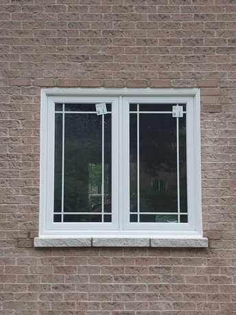 Double Casement Window Installation – Wilworks Renovations New double casement vinyl window with decorative grids installed by Wilworks Renovations in Durham Region