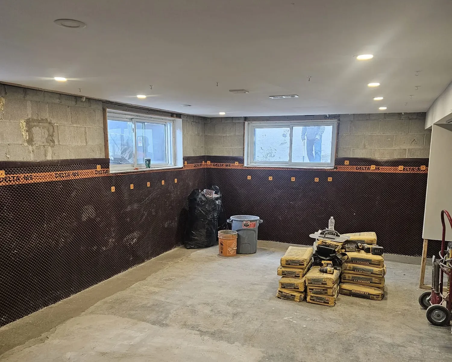 Delta-MS dimple membrane installed on basement walls during interior waterproofing in Durham Region